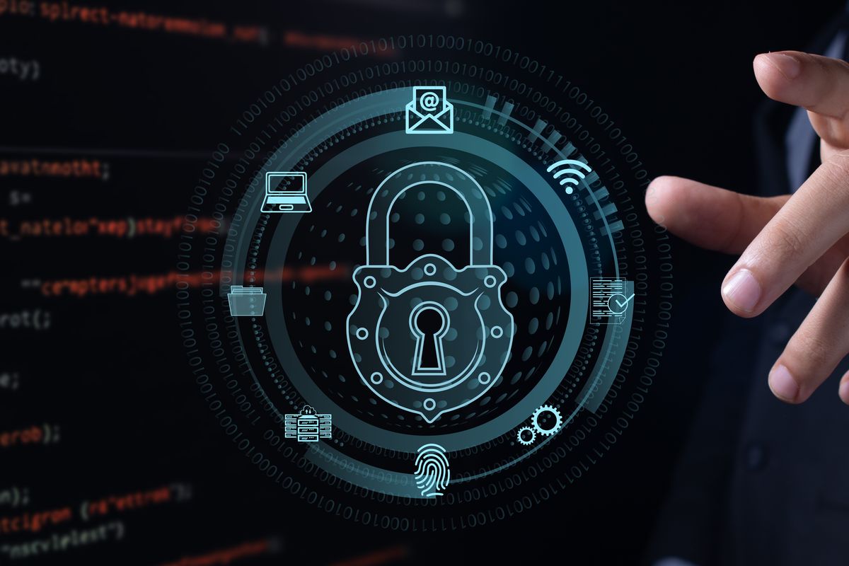 Businessman interacting with a digital cybersecurity padlock interface representing access control and identity management